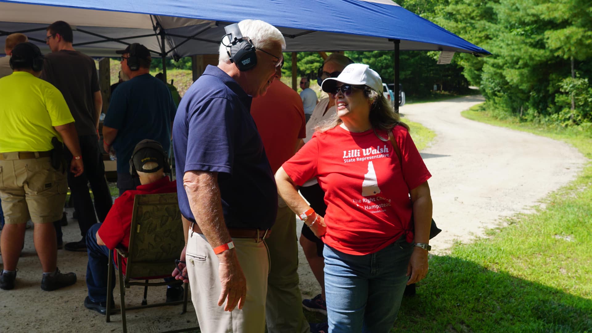 Attendees networking at the machine gun shoot